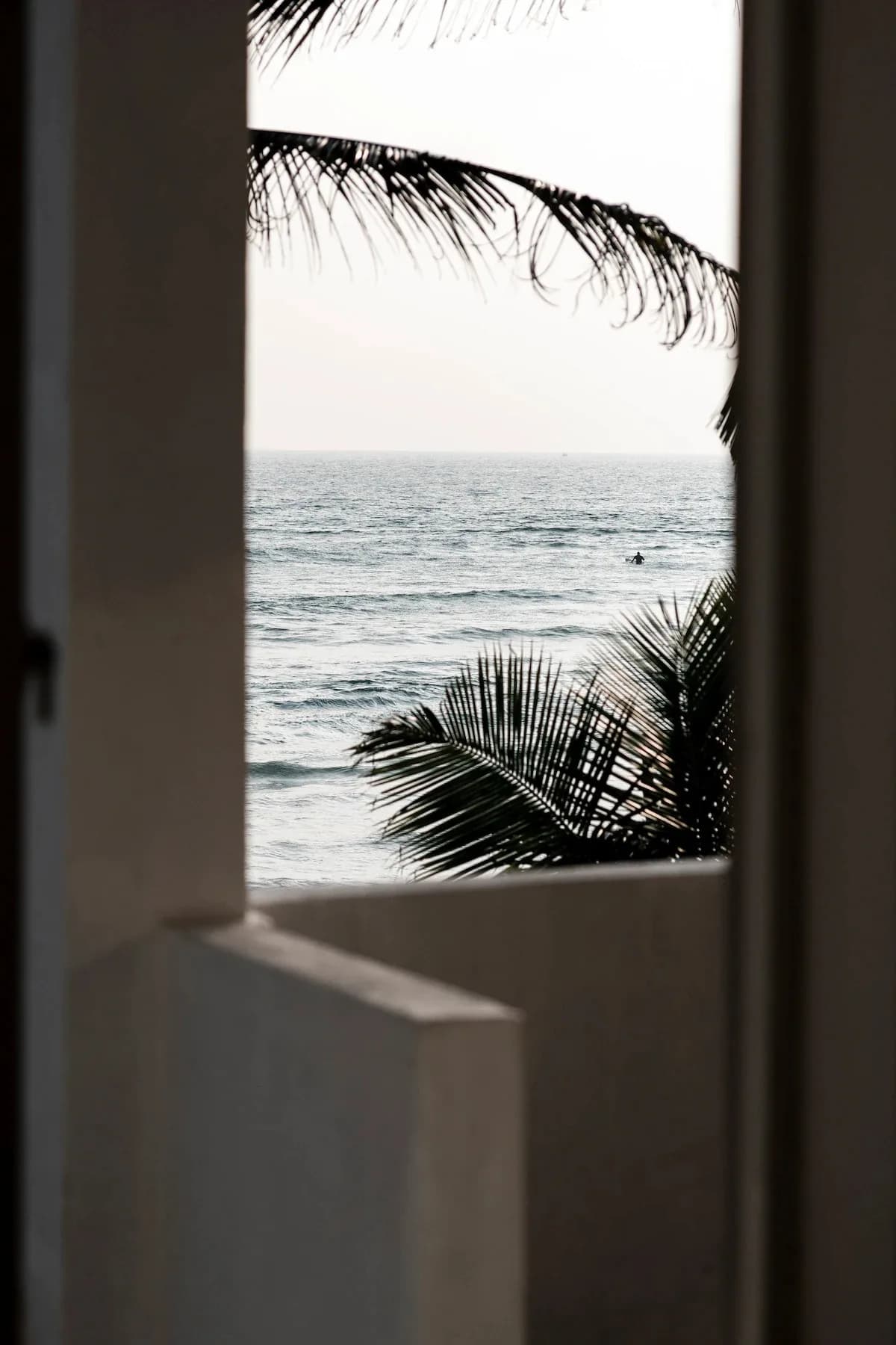 The ocean framed by the doorway at Wella Villa, Ahangama